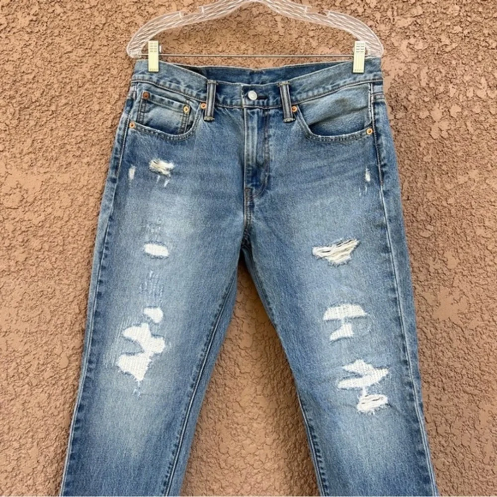 Levi’s 511 Jeans Men’s 32x30 Light‎ Blue Distressed Denim 5-pocket Style Raw Hem